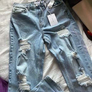 Light blue high waisted Cello pants.